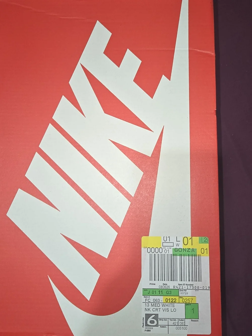 Nike White Low-Top Sneakers with Light Gray Swoosh